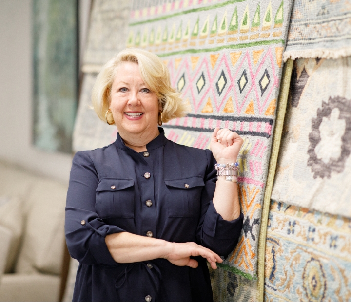 Charlotte Interior Designer showing rugs in furniture showroom